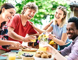 young adults sharing a meal together