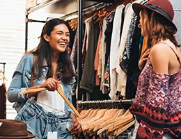 young women shopping for clothes